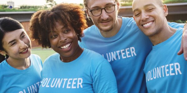 Group of happy and diverse volunteers